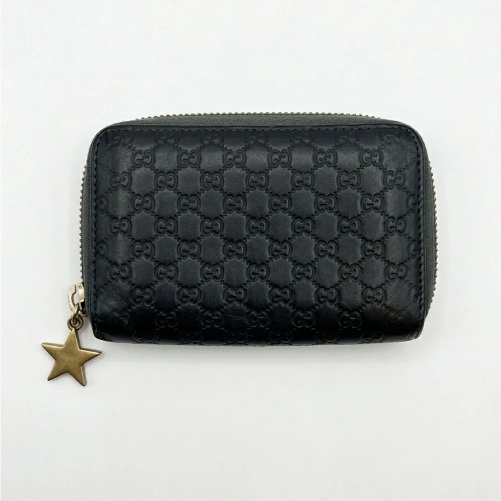 Gucci Black GG Embossed Zip-Around Coin Wallet with Star Charm